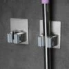 Merkloos Mop Houder - Mop - Houder - Bezem Ophangsysteem - Bezem Houder - Hanger - Staal -Tuin- En Buitenwinkels 1200x1200 952